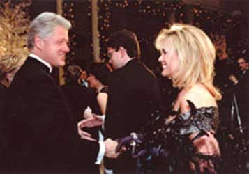 Bill Clinton | Debbie Simon wearing Constance McCardle Gown